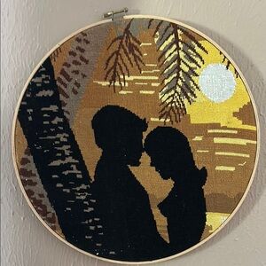 Finished cross stitch Hoop  wall decor. Approximately 12.5”